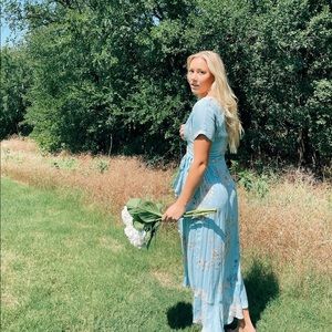 Blue and white long rap dress. With flower detail